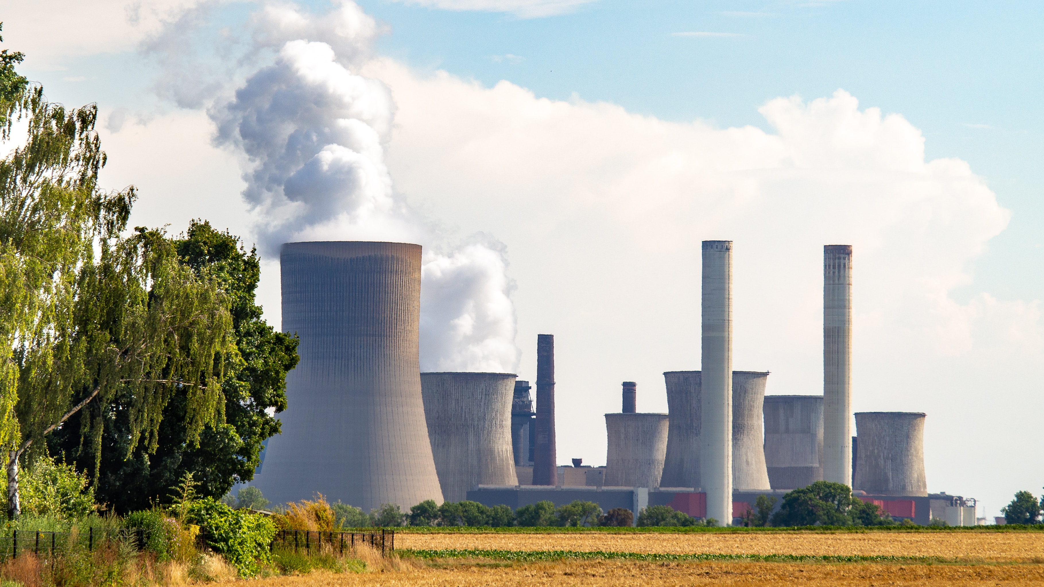 Photo of nuclear power plant chimneys from a distance
