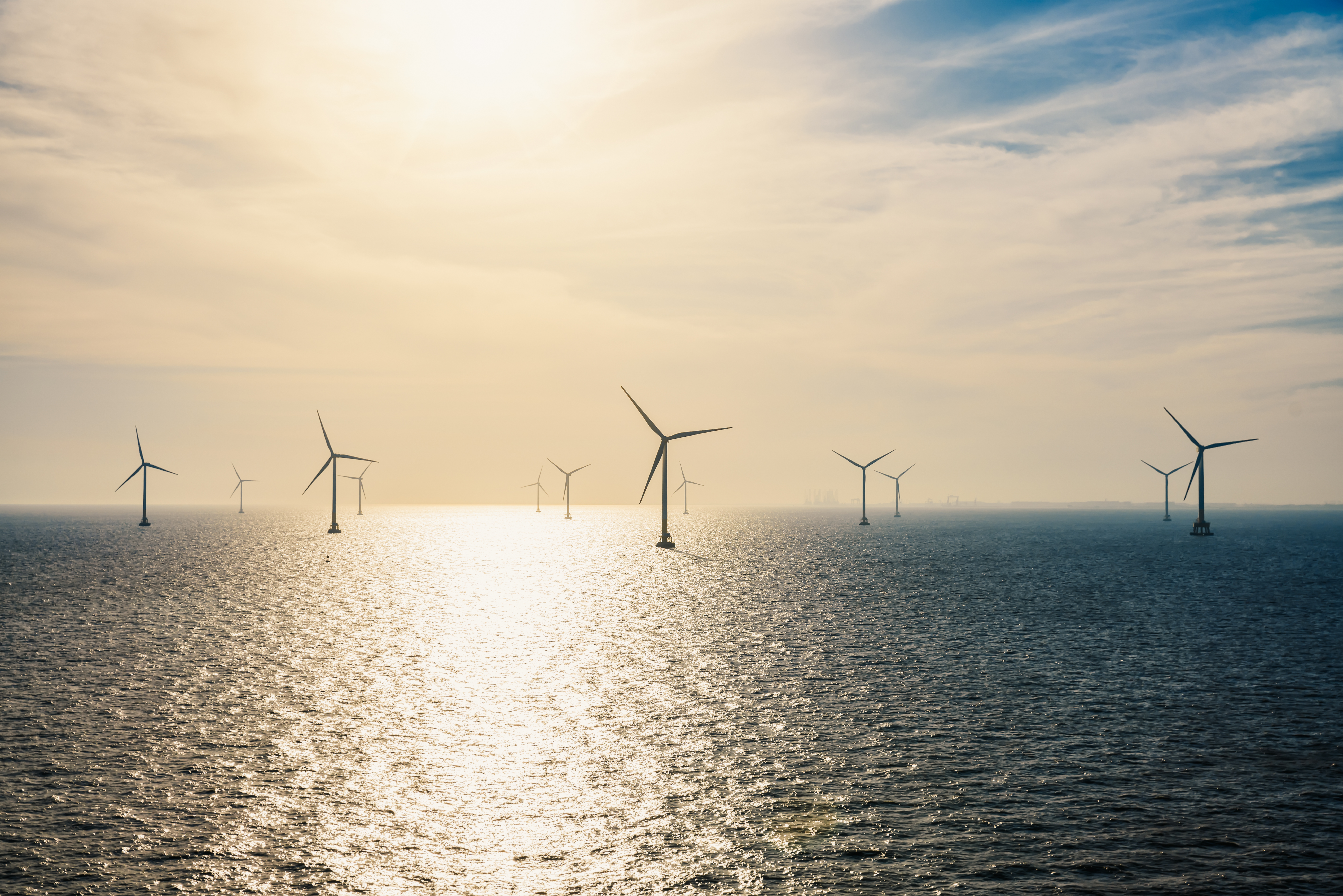 offshore wind farm at sunset