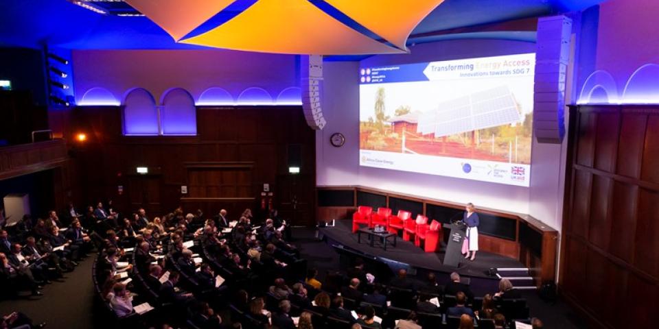 Presentation and audience members at TEA event in London, 2019