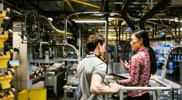Male and Female in an engineering factory