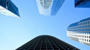 Buildings around a blue skyline
