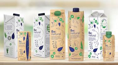 Seven cartons of Tetra Pak packaging with the Carbon Trust label