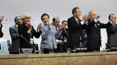 Clapping after the signing of the Paris Agreement