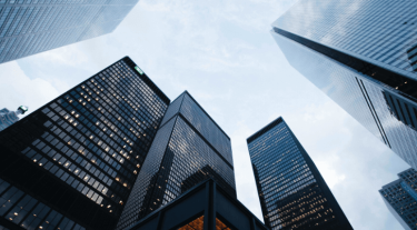 image looking up at high-rise office buildings