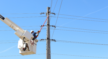 Man up an electricity pylon