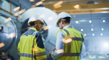Workers in industrial plant