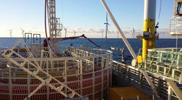 Cable laying sea vessel at wind farm
