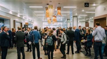 Event attendees mingling at the Low Carbon Cities 2018 conference