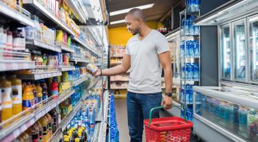 Man shopping in supermarket