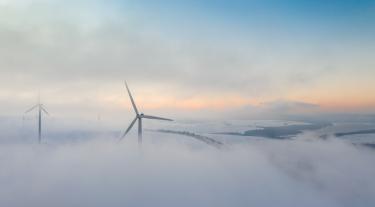Wind turbines in clouds